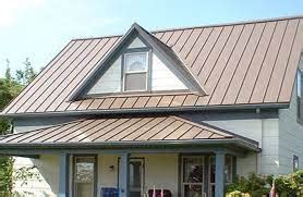 burnished slate metal roof on white house|burnished slate metal roof.